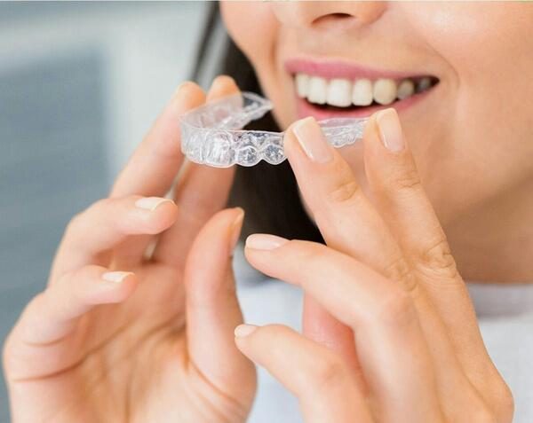 Clear aligners used for teeth straightening at REAL PEARL DENTAL CARE, Thaltej
